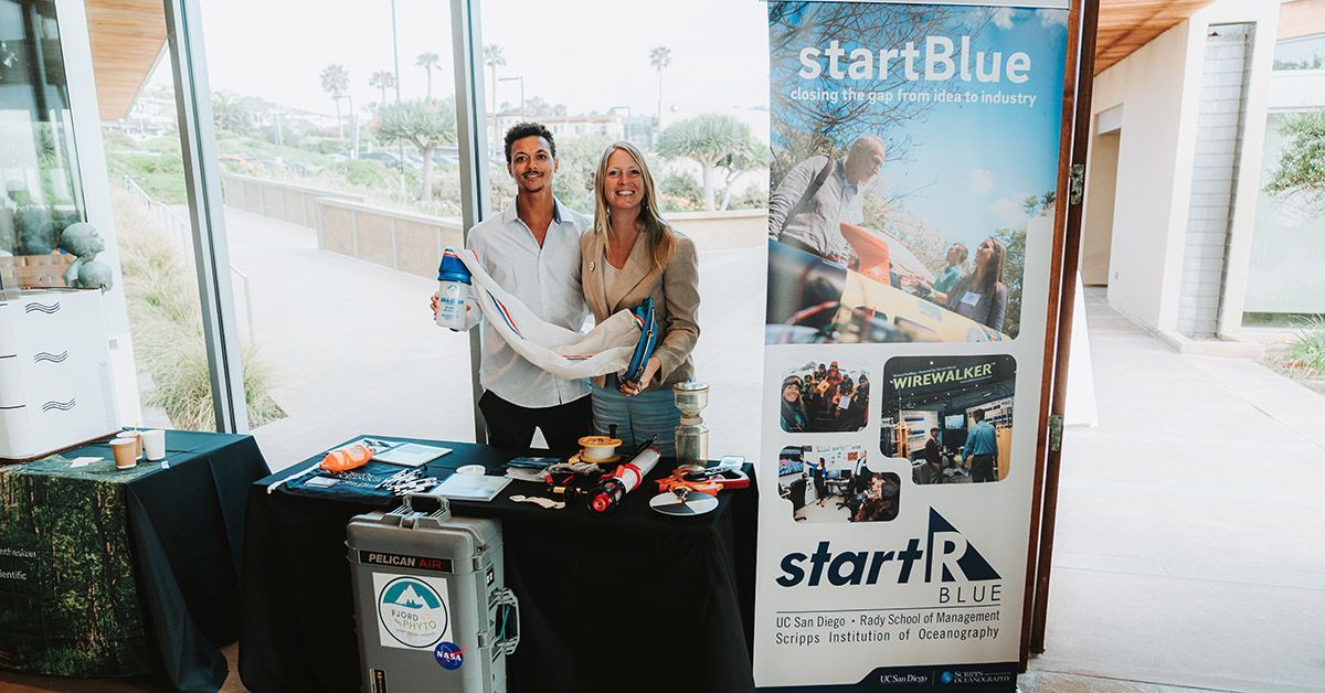 Scripps PhD candidate and co-founder Allison Cusick and Scripps PhD student Christian Johnson at StartBlue Demo Day 2024. 